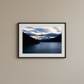 Fine art photography print of a tranquil twilight landscape over an Alaskan fjord near Juneau with snow-capped mountains.