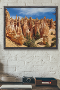 Bryce Canyon with orange hoodoos under a blue sky
