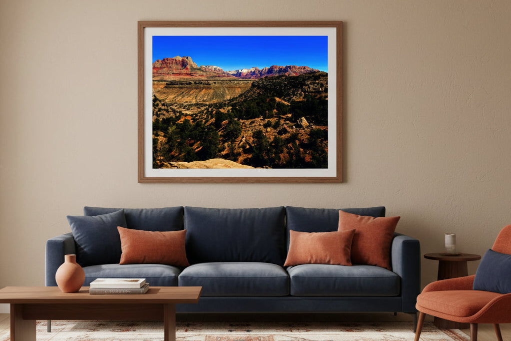 Fine art landscape photo print of red rock sandstone mesas and canyon vista under a blue sky in Zion National Park, Utah.