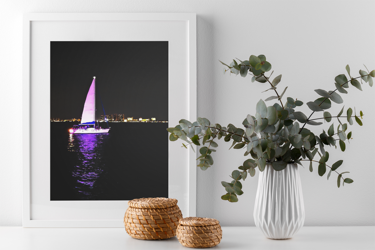 Illuminated Sailboat at Night Photo Print | Purple Glowing Sailboat Wall Art | Nighttime City Skyline Ocean Photography | Modern Nautical Decor